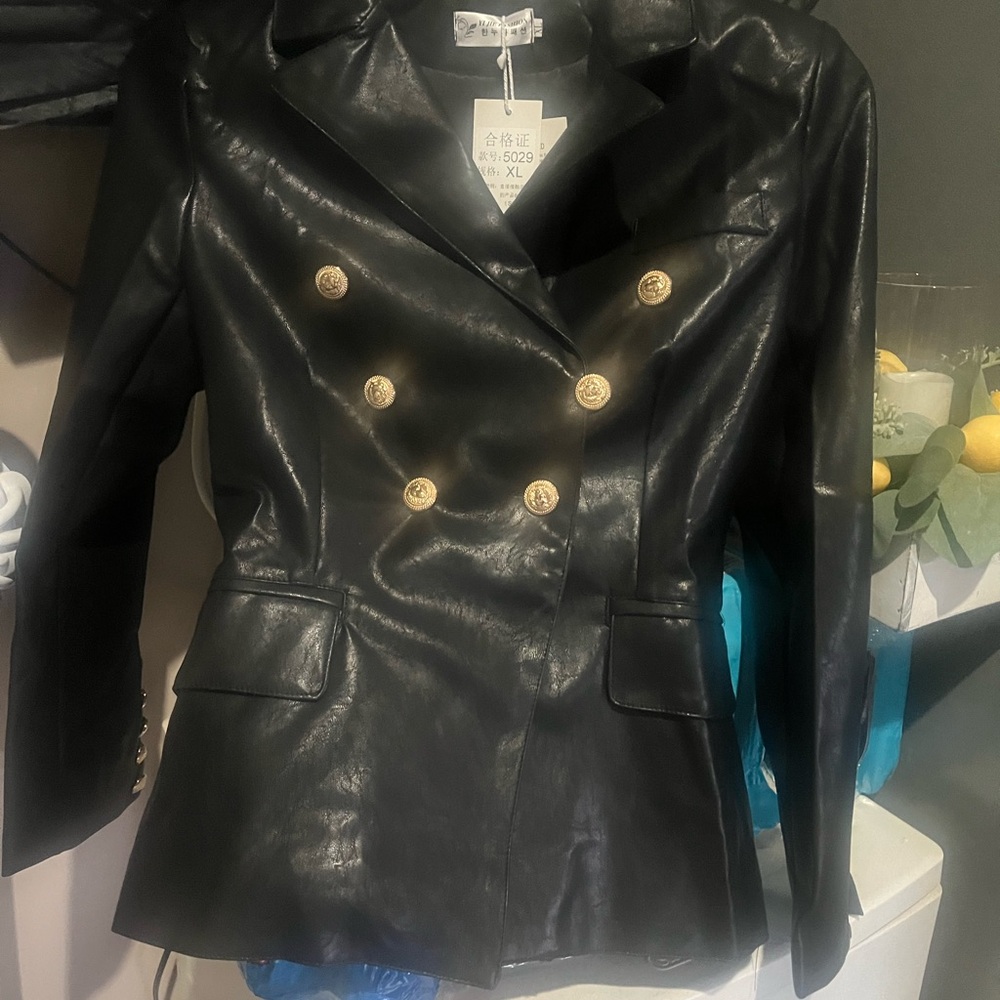 Made in china black leather kim kardashien. Labeled XL  fits more like a size 8.